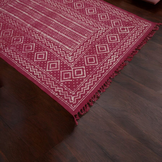Fushia Kaira Cotton Woven Dabu Printed Dhurrie